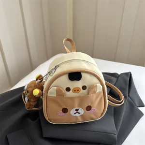 Cute cartoon bear PU leather mini backpack for women and kids, stylish casual daypack.
