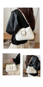 Vista dettagliata dell'elegante borsa baguette bianca con fibbia dorata chic e tracolla.