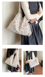 Korean style canvas shoulder bag with black star print casual tote bag for women daily commute.