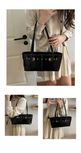 Black patent leather shoulder bag with chic buckle belt design for women daily commute.