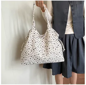 Korean style star print pleated canvas shoulder tote bag detailed view for daily commute fashion.