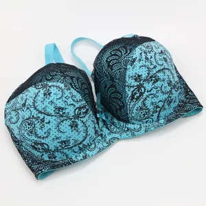 Sexy blue and black lace push-up bra for women, comfortable padded undergarment details.