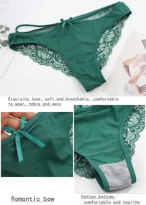 Nahaufnahme von sexy grünen Spitzenunterwäsche mit feiner Schleife und atmungsaktivem Schritt.
