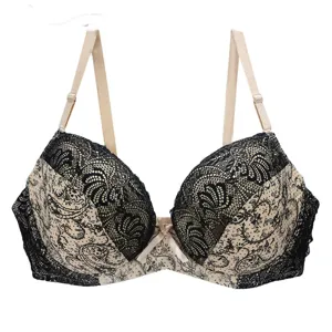 Detail view of lace push-up bra, featuring floral print and color block design with straps.