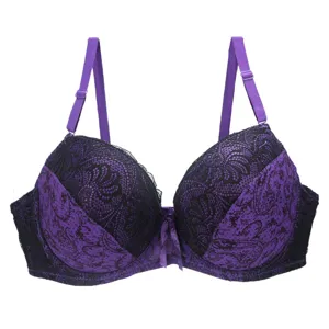Close-up of a purple and black lace push-up bra, showing detailed floral lace and straps.