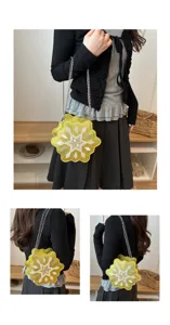 Trendy gold glitter snowflake shaped shoulder bag with stylish silver chain for women.