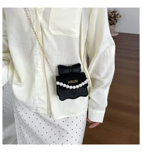 Süße Kinder Umhängetasche mit Schleife und Perlenkette, modische Tasche für Mädchen.