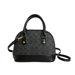 Classic black monogram dome handbag, stylish top handle shoulder bag for women daily wear.