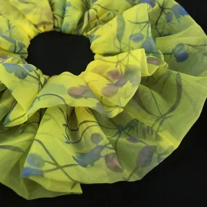 Yellow sheer floral chiffon hair scrunchie, lightweight botanical print oversized hair accessory.