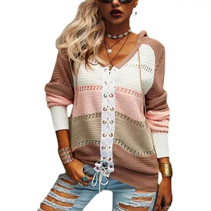 Close-up detail of the stylish color-block lace-up knitted hooded sweater for women.