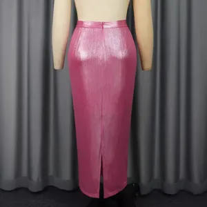 Back view detail of the pink metallic high-waisted midi skirt, showing back slit and slim fit.