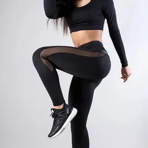Black mesh PU splicing yoga pants and long sleeve crop top for women fitness activewear.