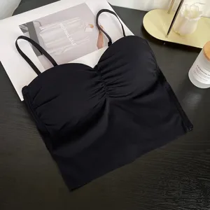 Detail view of black seamless ice silk camisole with built-in chest pad and ruched front design.