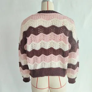 Detailed back view of the chevron pattern knit sweater showing intricate hollow-out texture.