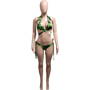 Detailed view of the green camouflage bikini three-piece swimsuit for women beach vacation.