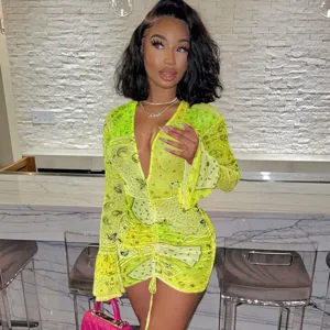 Sexy neon yellow sheer paisley print deep V ruched bodycon long sleeve dress detail.