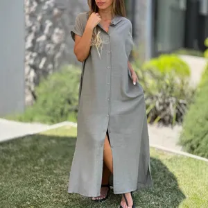 Detailed view of women casual solid color button down maxi shirt dress with short sleeves.