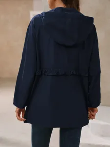 Womens waterproof hooded trench coat jacket with back ruffle detail, stylish outdoor outerwear.