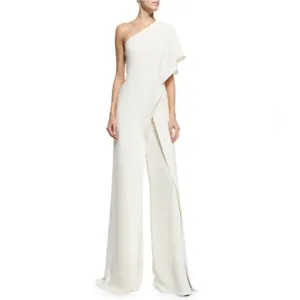 Detailed view of women's elegant white one-shoulder cape jumpsuit showcasing wide-leg design.
