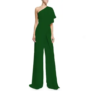 One-shoulder ruffle sleeve detail and wide-leg drape feature of the elegant green jumpsuit.