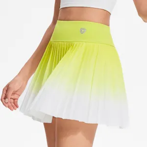 Detail shot of gradient pleated tennis skirt waist, high-waisted activewear close-up.