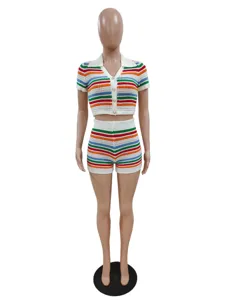Detailed view of the colorful striped knit two-piece set, featuring short sleeve polo top and shorts.