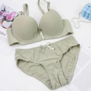 Solid color seamless women lingerie set with cute bow detail, comfortable everyday wear.