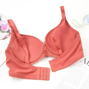 Detailed view of women's seamless solid color bra showing back strap and hook closure design.