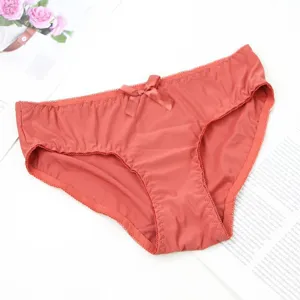 Comfortable seamless solid color women briefs with cute bow, perfect for daily wear.