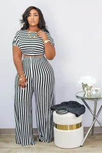Plus size black and white striped two piece outfit short sleeve top and wide leg pants