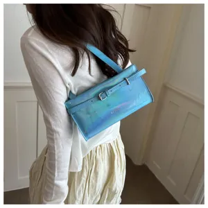 Holographic shoulder bag with belt buckle detail, stylish and trendy womens fashion accessory.