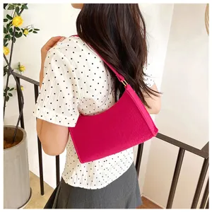 Schicke pinke Schultertasche für Damen, modische minimalistische Achseltasche für Alltag.