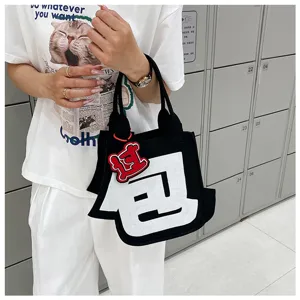 Creative felt tote bag with bold Chinese character design, lightweight and stylish for daily commute.