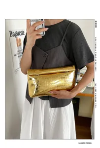 Gold metallic crocodile pattern clutch bag, stylish minimalist daily handbag for women.