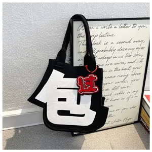 Creative black felt tote bag with bold Chinese character design, casual daily handbag for women.