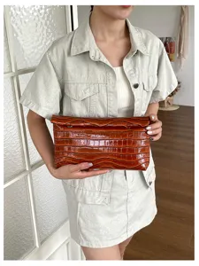 Brown crocodile pattern faux leather clutch bag, chic minimalist style for daily work and commuting.