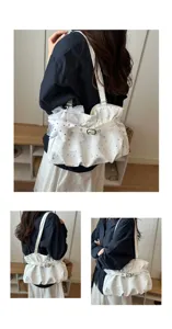Chic star print ruched shoulder bag for women, trendy underarm purse with buckle.
