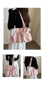 Pink star print shoulder bag detail view showing stylish design, cute star pendant and belt buckle.