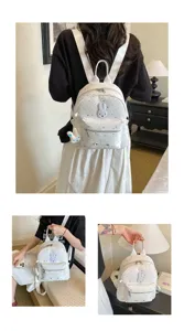 Cute minimalist star pattern white PU leather backpack with rabbit patch for daily use.