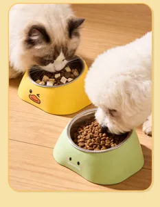 Detailed view of double pet bowls with cute animal designs, stainless steel inserts and colorful shells.