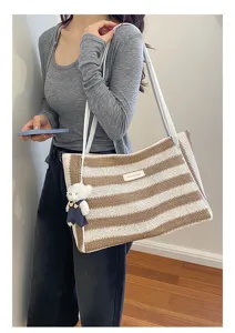 Sac cabas en paille rayé élégant pour femme, grand sac à épaule pour vacances à la plage.