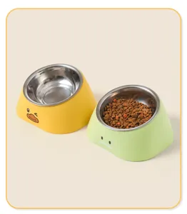 Stainless steel pet bowl detail, slanted double bowls for cats and dogs, cute cartoon design.