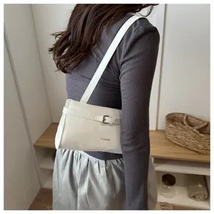 Minimalist white underarm shoulder bag detail, stylish PU leather casual purse for women.