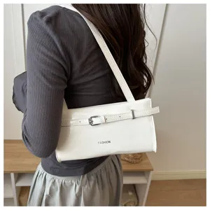White underarm shoulder bag detail showing stylish buckle and clean PU leather design for daily wear.