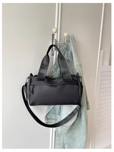 Bolso bandolera negro minimalista, elegante bolso cilíndrico casual para uso diario.