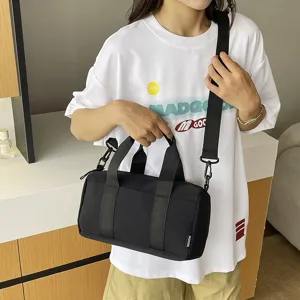 Klassieke zwarte cilinder schoudertas voor dames, stijlvolle casual reistas handtas.