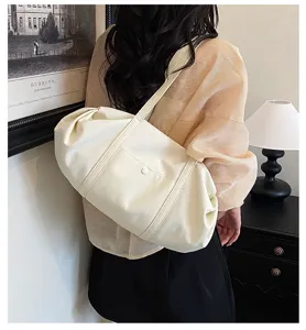 Minimalist off-white canvas shoulder bag, large capacity casual tote for women daily commute.