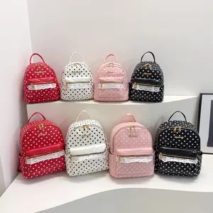 Polka dot women backpack with lace trim, stylish casual daypack and student bookbag.