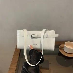 White patent leather shoulder bag for women, stylish minimalist underarm handbag with buckle.