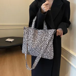 Leopard print tote bag for women, large capacity stylish shoulder and crossbody handbag.